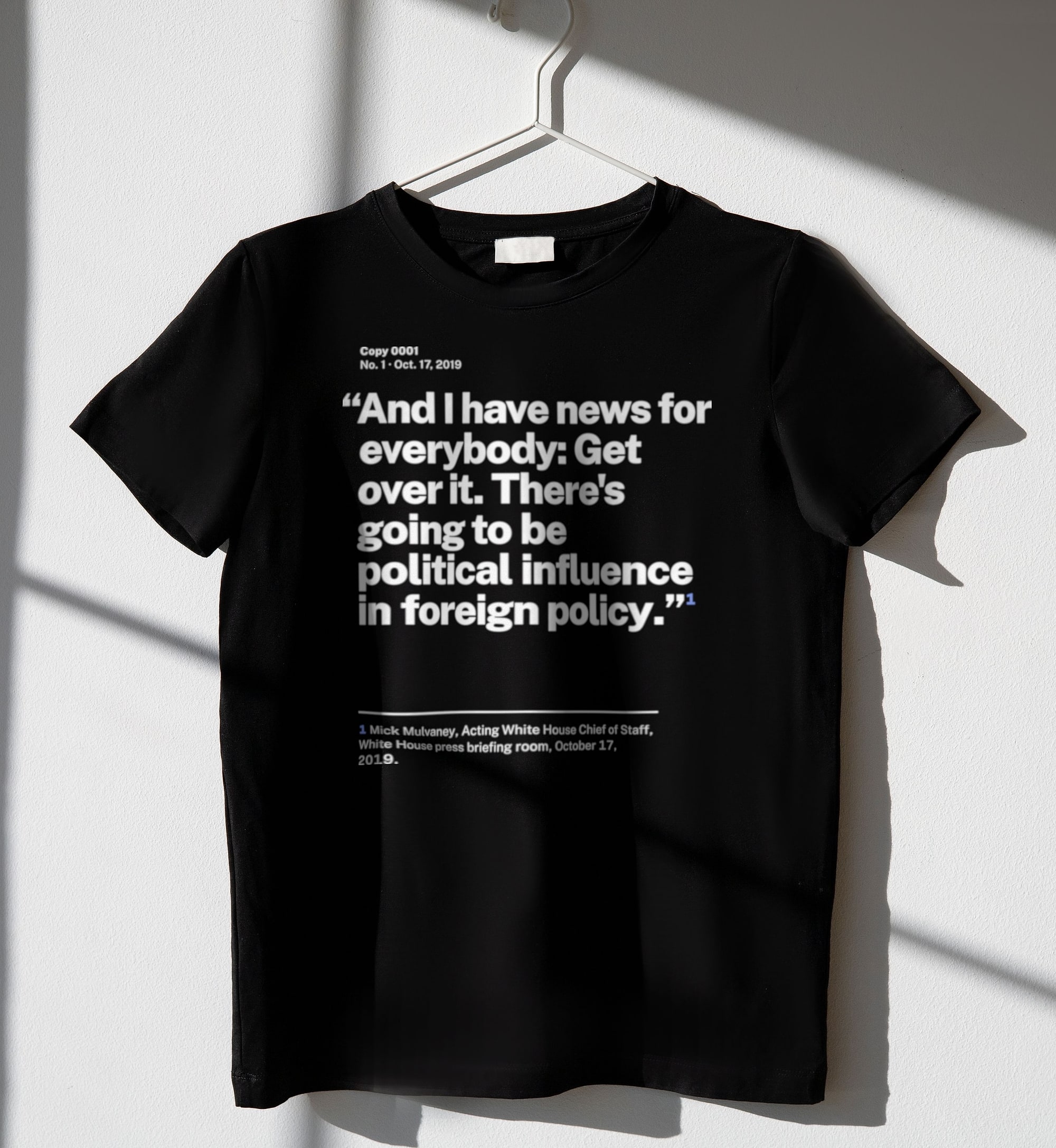 No. 0001, statement style, black tee on a hanger