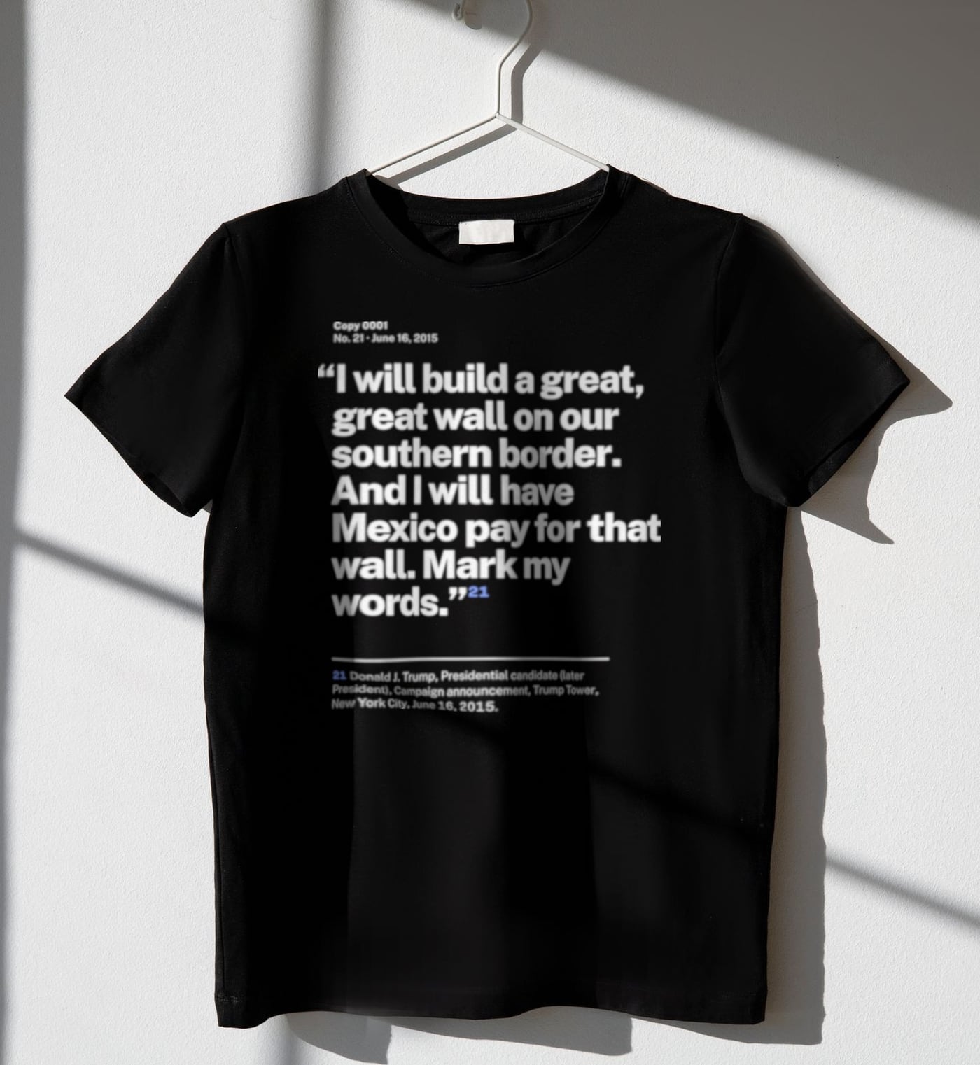 No. 0021, statement style, black tee on a hanger