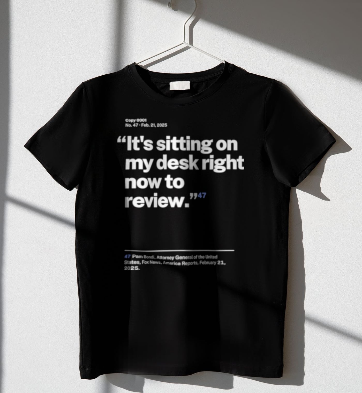 No. 0047, statement style, black tee on a hanger