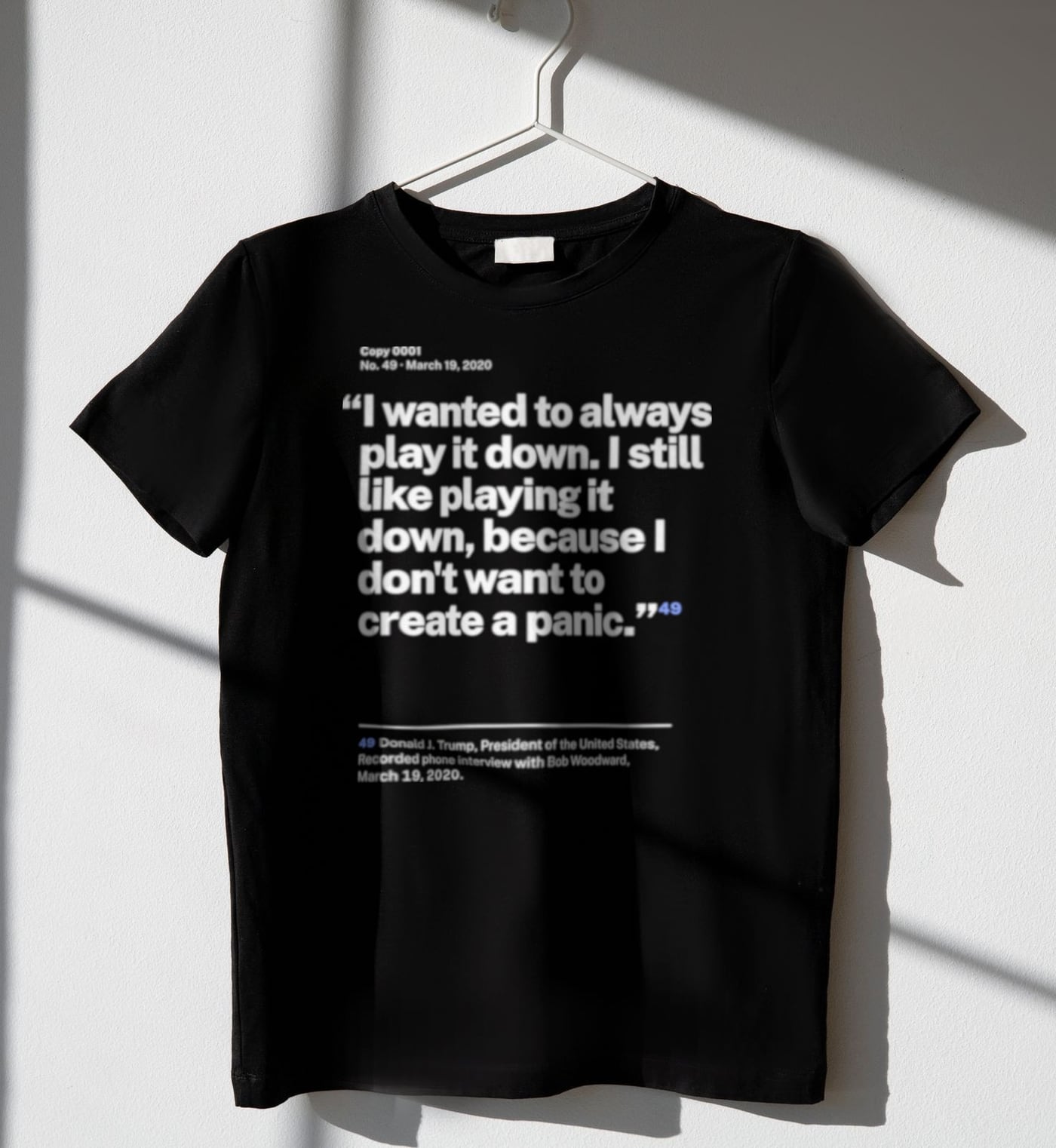 No. 0049, statement style, black tee on a hanger