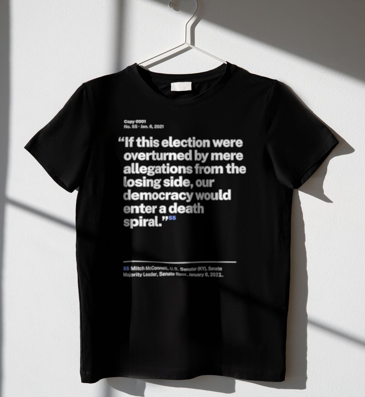 No. 0055, statement style, black tee on a hanger