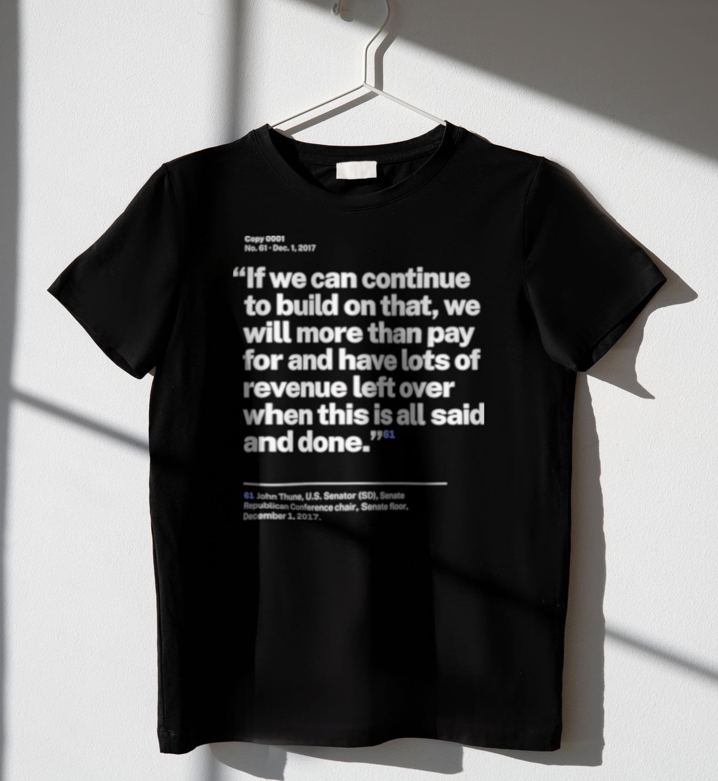 No. 0061, statement style, black tee on a hanger