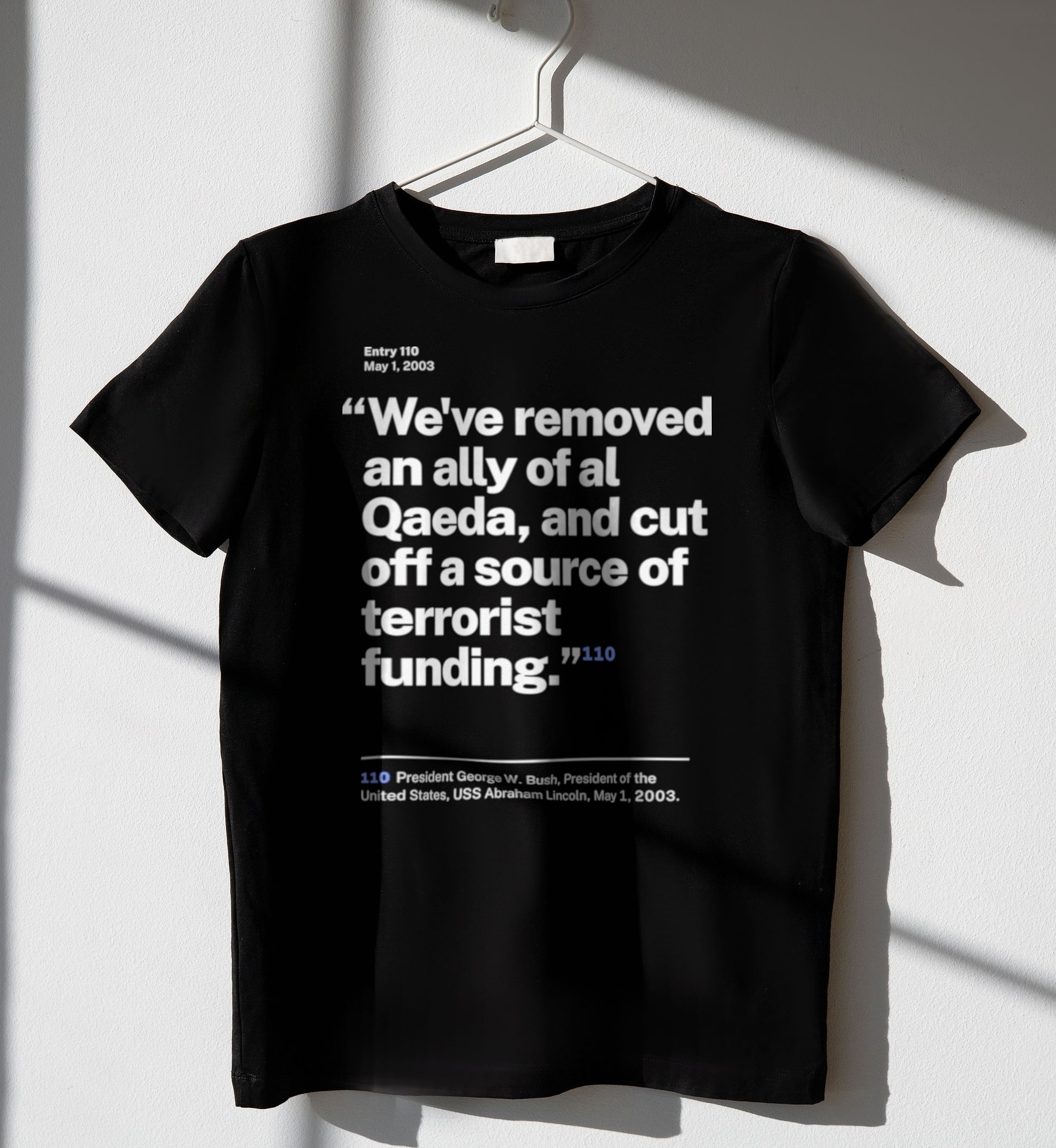 No. 0110, statement style, black tee on a hanger