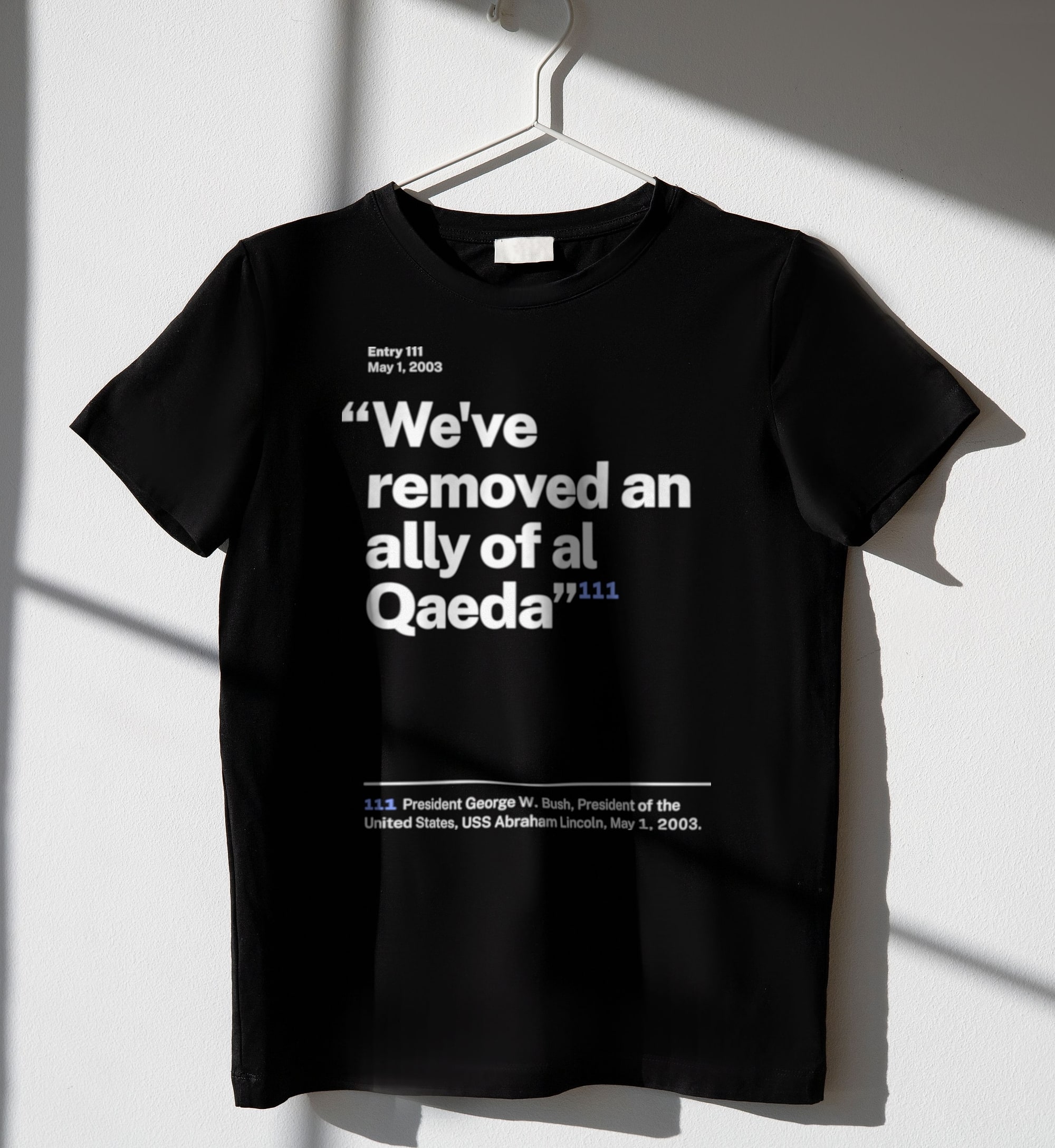 No. 0111, statement style, black tee on a hanger